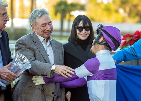 Reddam Racing’s Slow Down Andy and jockey Mario Gutierrez win the G2 $300,000 Los Alamitos Futurity Saturday, December 11, 2021 at Los Alamitos Race Course, Cypress, CA.<br><br />
 From left, owners J. Paul &amp; Zillah Reddam and jockey Gutierrez celebrate.<br><br />
Benoit Photo.<br><br />

