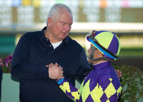 Owner Lee Searing, left, celebrates with jockey Victor Espinoza, right, after Express Train&#39;s victory in the Grade II, $200,000 San Pasqual Stakes, Saturday, February 5, 2022 at Santa Anita Park, Arcadia CA.<br><br />
&#169; BENOIT PHOTO