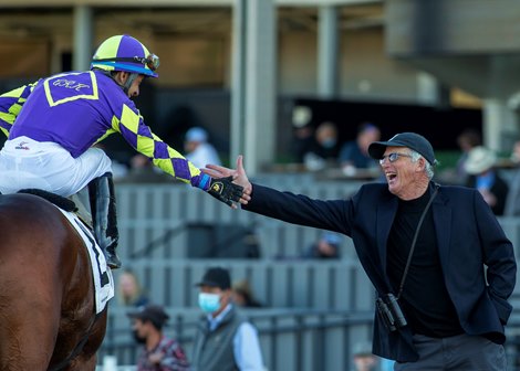 Trainer John Shirreffs, right, celebrates with jockey Victor Espinoza, left, after Express Train&#39;s victory in the Grade II, $200,000 San Pasqual Stakes, Saturday, February 5, 2022 at Santa Anita Park, Arcadia CA.<br><br />
&#169; BENOIT PHOTO