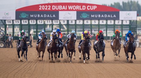 The winner Crown Pride (Damian Lane, 3rd from right) break from the stalls when winning the UAE Derby<br>
Meydan 26.3.22 Pic: Edward Whitaker