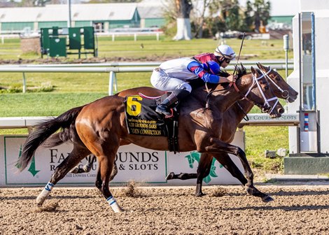 3/26/2022 - Echo Zulu with Joel Rosario aboard gets a nose in front of Hidden Connection to capture the 55th running of the Grade II Fair Grounds Oaks at Fair Grounds