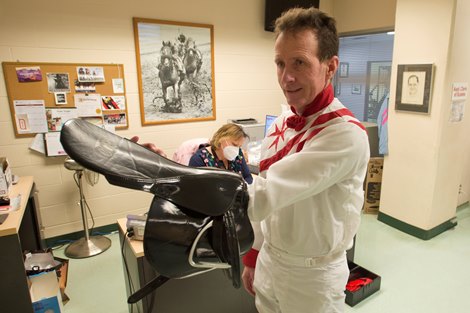 Thoroughbred Jockey Gary Boulanger weighs in with weighbridge clerk Alison Read (rear) for the start of the 133-day thoroughbred racing season April 16, 2022, postal at 1:10 PM