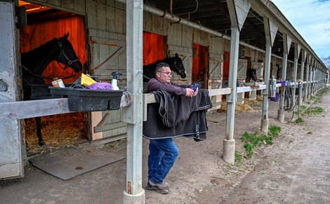 Trainer Kerry Metivier waits on an exercise rider before his horses horses took to the track for the first time this season as the Oklahoma Training Center opened for training Saturday Apr. 17, 2022 in Saratoga Springs, N.Y.    Photo by Skip Dickstein