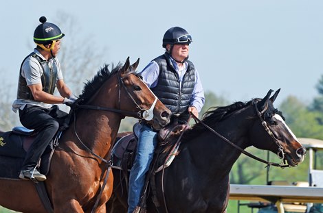 April 23, 2022: Golden Pal and exercise rider Jose Hernandez head to the Keeneland turf course Saturday morning...<br><br />
Rick Samuels/The Blood-Horse