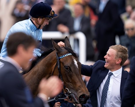 George Boughey congratulates Cachet (James Doyle) after the 1000 Guineas<br><br />
Newmarket 1.5.22 Pic: Edward Whitaker
