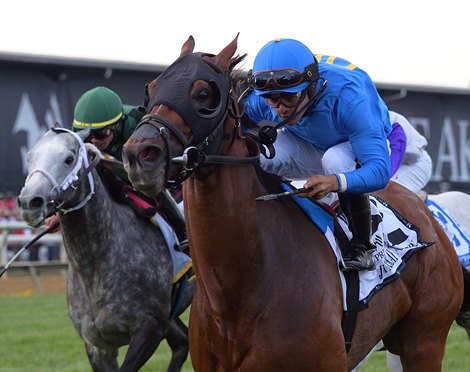 Carotari wins the Jim McKay Turf Sprint Stakes at Pimlico Race Course