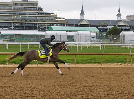 Charge It training with the twin spires in background. <br>
Training at Churchill Downs in Louisville, Ky., on May 1, 2022.
