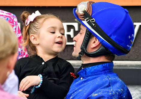 Elena Prat with Flavien Prat in the winner’s circle after win with Matareya of the Eight Belles (G2) at Churchill Downs in Louisville, KY on May 6, 2022.