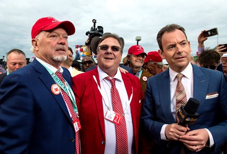 (L-R): Rich Dawson, Eric Reed and Nick Luck after Rich Strike with Sonny Leon win the Kentucky Derby (G1) at Churchill Downs in Louisville, Ky., on May 7, 2022.