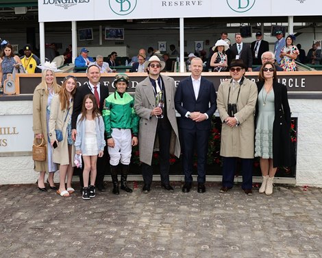 The Connection of the Voices of the Devil celebrates in the Post-Churchill Distaff Turf Mile (G2) Winners Circle at Churchill Downs