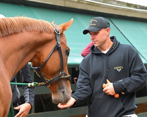 Jeremia Rudan with Fenwick<br>
Preakness coverage at Pimlico Racecourse on May 19, 2022.