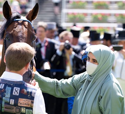 Baaeed's owner Sheikha Hissa greets him after the Queen Anne Stakes at Ascot Racecourse