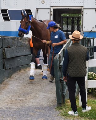 Flightline arrives at Belmont Park, June 7, 2022<br><br />
assistant Juan Leyva watching