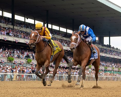 Clairiere with Joel Rosario, left, defeats Malathaat in the Ogden Phipps (G1) at Belmont Park on June 11, 2022