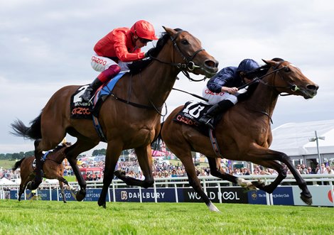 Tuesday (Ryan Moore) beats Emily Upjohn (Frankie Dettori) in The Oaks Epsom 3.6.22 Pic: Edward Whitaker