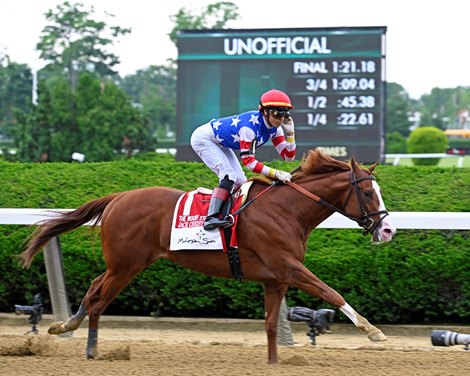 Jack Christopher with Jose Ortiz wins the Woody Stephens Presented by Mohegan Sun (G1) at Belmont Park on June 11, 2022.