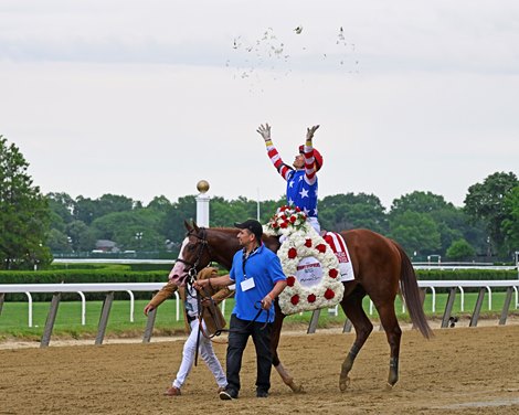 Jack Christopher with Jose Ortiz wins the Woody Stephens Presented by Mohegan Sun (G1) at Belmont Park on June 11, 2022.