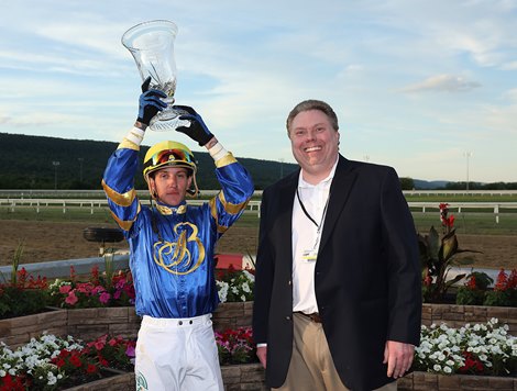 Jockey Tyler Conner wins the Penn Mile Trophy with Owner/River Jeremy Brooks after Wow Whata Summer won the $400,000 2nd Class Penn Mile at Penn National Speedway in Granville, PA on Friday, May 3. 6 year 2022