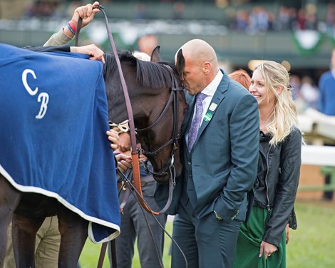 Casi Edwards, right, looks on as Bob Edwards kisses Rushing Fall. Rushing Fall with Javier Castellano wins Queen Elizabeth II Challenge Cup (G1T) Oct. 13, 2018 Keeneland in Lexington, Ky.