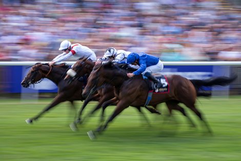 Deauville Legend (Farside) beats Al Qareem (centre) and Walk Of Stars in the Bahrain Trophy<br><br />
Newmarket 7.7.22 Pic: Edward Whitaker
