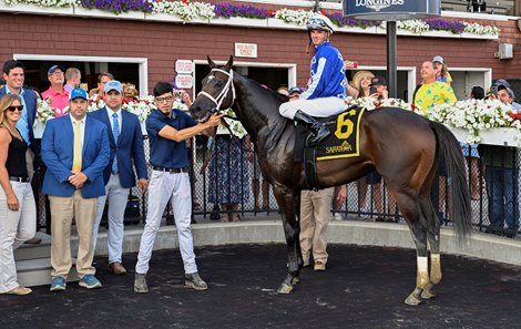 Mo Strike's connection (#6) with jockey Florent Geroux on board in the winners' circle after winning the 107th run of The Sanford Racecourse in Saratoga on Saturday, July 16, 2022 at Saratoga Springs, NY