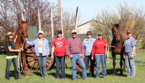 Dr. Richard Bowman (center) with the Bowman Second Chance Thoroughbred Adoption team