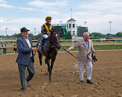(L-R): Owners Larry Roth and Robert Clay lead in Olympiad to the winner's Circle. Olympiad with Junior Alvarado wins the Stephen Foster (G2) at Churchill Downs. <br>
Stephen Foster day at Churchill Downs on July 2, 2022