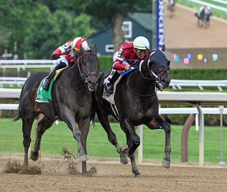 Gunite with jockey Tyler Gaffalione #1, duels to the wire with #5 Accretive with jockey Irad Ortiz Jr. to win the 30th running of The Amsterdam at the Saratoga Race Course Sunday July 31, 2022 in Saratoga Springs N.Y. Photo Special to the Times Union by Skip Dickstein