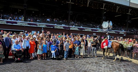 All the connections gather in the winner's circle as Nest ridden by Iran Ortiz Jr.  goes gate to wire in the 106th running of The Coaching Club American Oaks, a Grade 1 event by 10 lengths at the Saratoga Race Course Saturday July 23, 2022 in Saratoga Springs NY