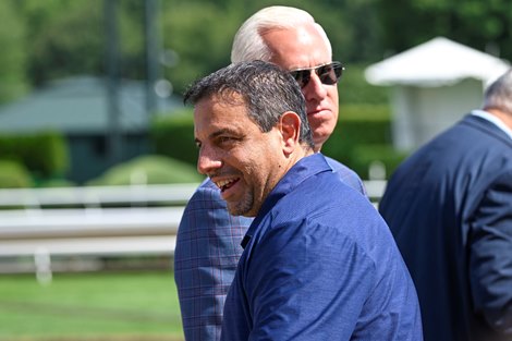 Part owner Mike Repole waits for Nest ridden by Iran Ortiz Jr.  to return to the winner's circle after winning the 106th running of The Coaching Club American Oaks, a Grade 1 event by 10 lengths at the Saratoga Race Course Saturday July 23, 2022 in Saratoga Springs NY Photo Special to the Times Union by Skip Dickstein