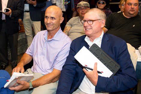 (L-R): Terry Finley and Bill Farish after the sale of Hip 126 at the August yearling session of The Saratoga Sale on Aug. 9, 2022, in Saratoga Springs, N.Y.
