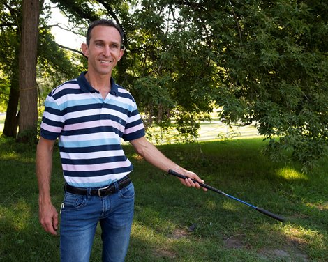 Ramon Dominguez with his 360GT riding crop. <br><br />
Training in Saratoga at Saratoga Race Course in Saratoga Springs, N.Y., on Aug. 4, 2022.