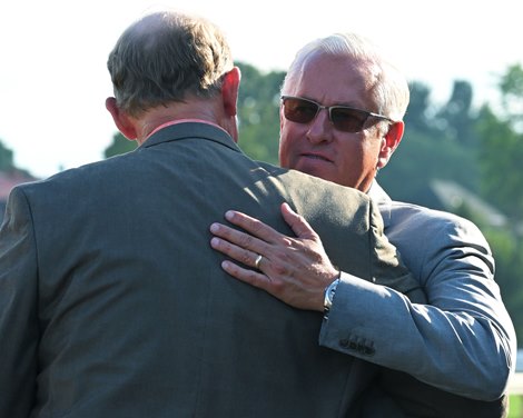 (L-R): Elliott Walden being hugged by trainer Todd Pletcher. Life Is Good with Irad Ortiz Jr. wins the Whitney (G1)<br>
Racing at Saratoga Race Course  in Saratoga Springs, N.Y., on Aug. 6, 2022.