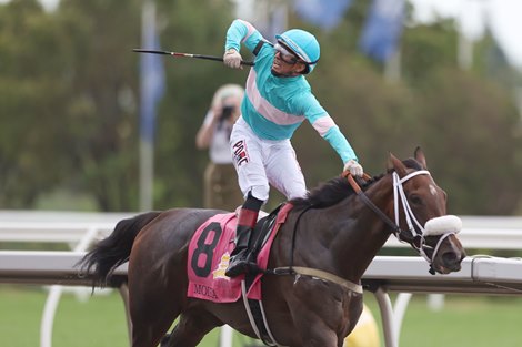 Jockey Rafael Hernandez celebrates as he guides Moira to victory in the Queen&#39;s Plate Stakes