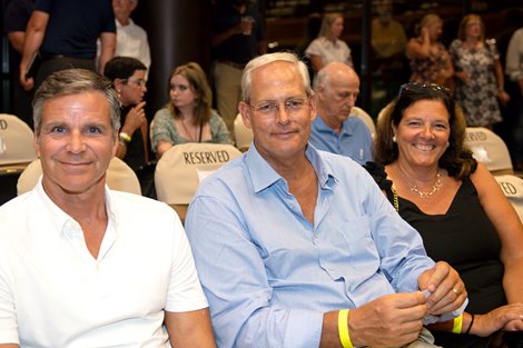 (L-R): Eric Gustafson, Ned Toffey and Katie Toffey at the August yearling session of The Saratoga Sale on Aug. 8, 2022, in Saratoga Springs, N.Y.