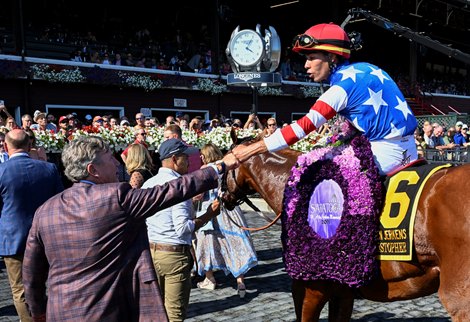 Jockey Jose Ortiz gives the owner of Jack Christopher a fist pump on the way in to the winner’s circle after winning the 38th running of The H. Allen Jerkens Memorial at the Saratoga Race Course Saturday Aug. 27, 2022 in Saratoga Springs N.Y.  Photo Special to the Times Union by Skip Dickstein
