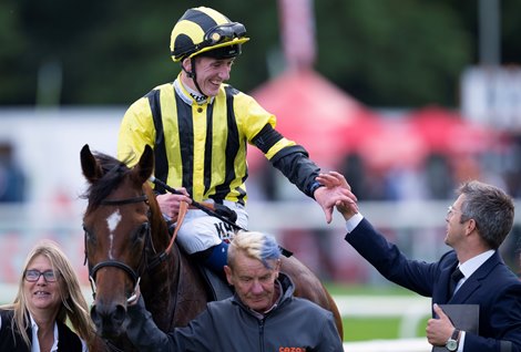 Roger Varian greets Eldar Eldarov (David Egan) after winning the St. Leger<br><br />
Doncaster 11.9.22 Pic: Edward Whitaker