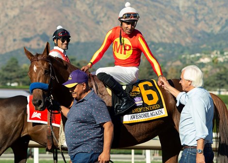 Trainer Bob Baffert, right, celebrates with jockey Edwin Maldonado after Defunded&#39;s victory in the Grade I, $300,000 Awesome Again, Saturday, October 1, 2022 at Santa Anita Park, Arcadia CA.<br><br />
&#169; BENOIT PHOTO