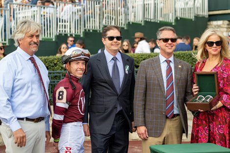 (LR): Steve Asmussen, Tyler Gaffalione, Ron Winchell, presenter Hunter and Jennifer Bates.  Gunite with Tyler Gaffalione beat Perryville at Keeneland in Lexington, Ky., on October 22, 2022.