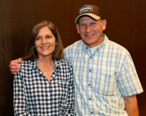 (L-R): buyers Lisa Hofstetter and her brother Michael Golden with Sycamore Hall Stud. Hip 1370 colt by Speightstown out of Tempers Rising at Taylor Made