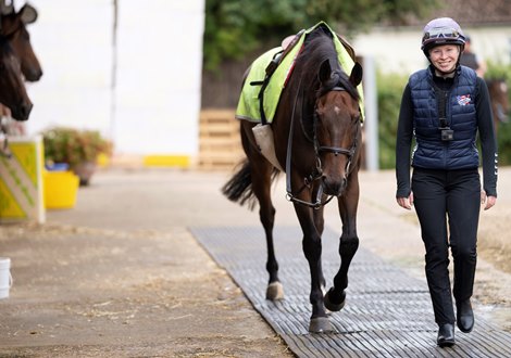 Rosie Margarson and Caribbean Knight (Bean) return to Graham Lodge Stables after exercise<br>
Newmarket 13.9.21 Pic: Edward Whitaker