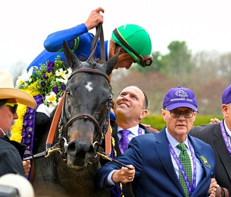Chad C. Brown and Steve Laymon walk in Goodnight Olive with Irad Ortiz Jr. after winning the Filly and Mare Sprint (G1) at Keeneland in Lexington, KY on November 5, 2022.