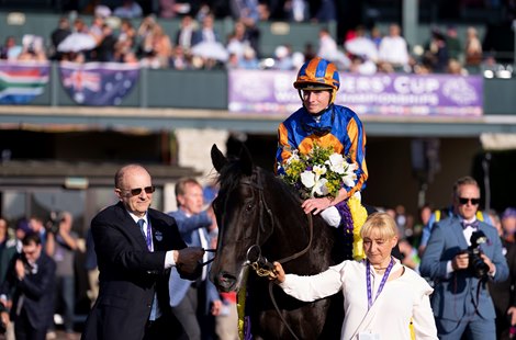 Michael Tabor with Meditate (Ryan Moore) after winning the Juvenile Fillies Turf<br><br />
Keeneland 4.11.22 Pic: Edward Whitaker