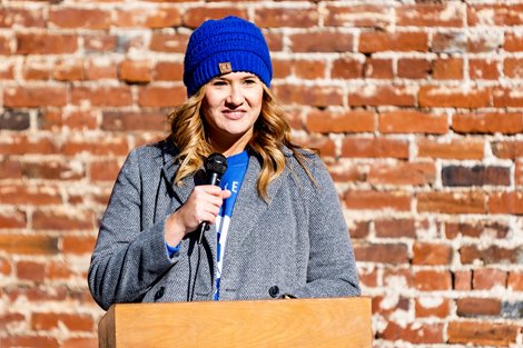 Lauren Biddle speaks at the unveiling of the Secretariat mural in Paris, KY, on Nov. 19, 2022.