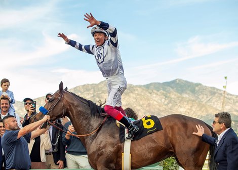 Jockey Lanfranco Dettori performs his famous flying dismount after his victory aboard Country Grammer in the Grade II $200,000 San Antonio Stakes Monday, December 26, 2022 on .<br>
Benoit Photo