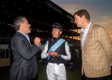 Aron Wellman of Eclipse Thoroughbred Partners, left, and trainer H. Graham Motion, right, celebrate with jockey Juan Hernandez, middle, in the winner&#39;s circle after Speaking Scout&#39;s victory in the Grade I, $400,000 Hollywood Derby, Saturday, December 3, 2022 at Del Mar Thoroughbred Club, Del Mar CA.<br>
&#169; BENOIT PHOTO