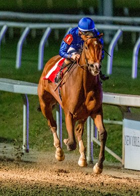 12/26/2022 - Pretty Mischievous with jockey Brian Hernandez, Jr. wins the 2nd running of the $100,000 Untapable Stakes at Fair Grounds.  Hodges Photography / Jan Brubaker