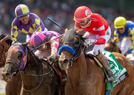 Practical Move and jockey Ramon Vazquez, right, nose out Mandarin Hero, #8, (Kazushi Kimura), middle, and Skinner, #7, (Victor Espinoza), left, for victory in the Grade I $750,000 Runhappy Santa Anita Derby Saturday, April 8, 2023 at Santa Anita Park, Arcadia, CA.<br><br />
Benoit Photo