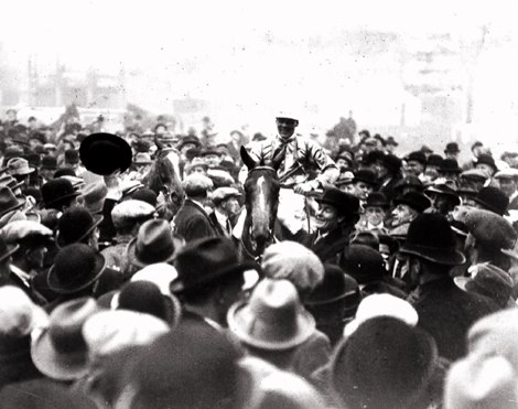 The 1923 Grand National Winner, Sergeant Murphy, being led back in after his victory