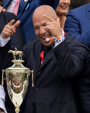 Ramiro Restrepo with trophy. Ramiro Restrepo with trophy.